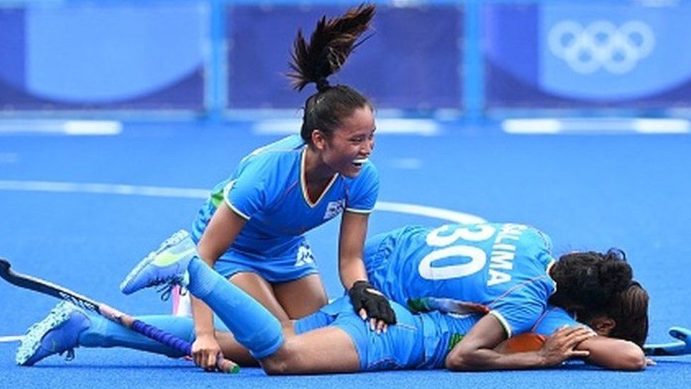 Players of India celebrate after defeating Australia 1-0 in their women's quarter-final match of the Tokyo 2020 Olympic Games