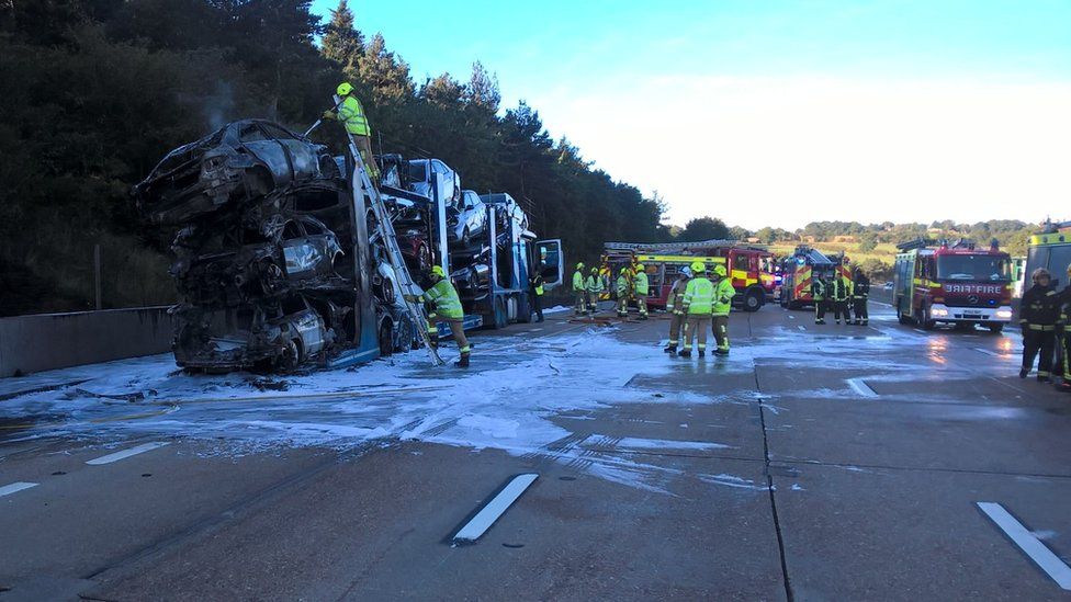 M25 car transporter fire causes 'gridlock' BBC News