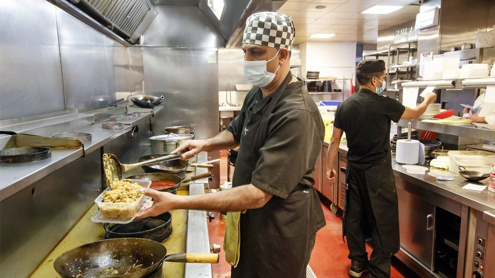 Food being prepared by a Chef in the kitchen at the Mumtaz restaurant in Leeds. They will be handing out free food boxes during half term for any child who would normally get a free school lunch after MPs voted to reject a motion to provide food to those in need during the school holidays.