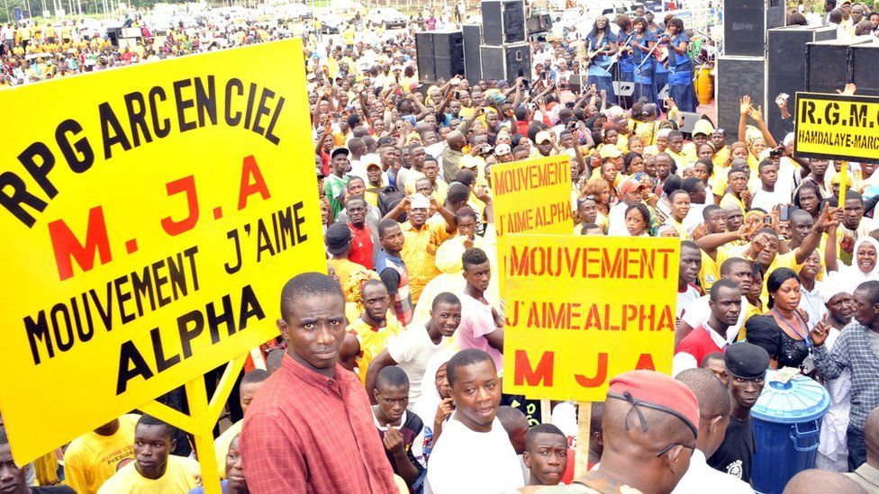 Supporters of 'The Rally of the Guinean People' (RPG) gather on August 11, 2015 in Conakry, Guinea