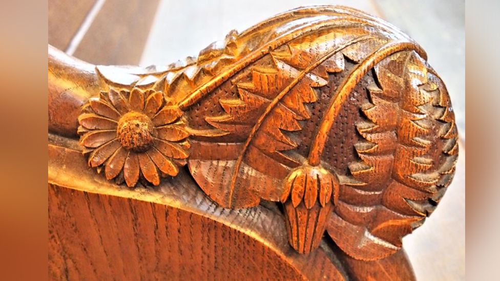 Carved pew end, St Andrew's, Hingham