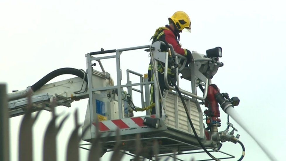 Firefighters at the factory