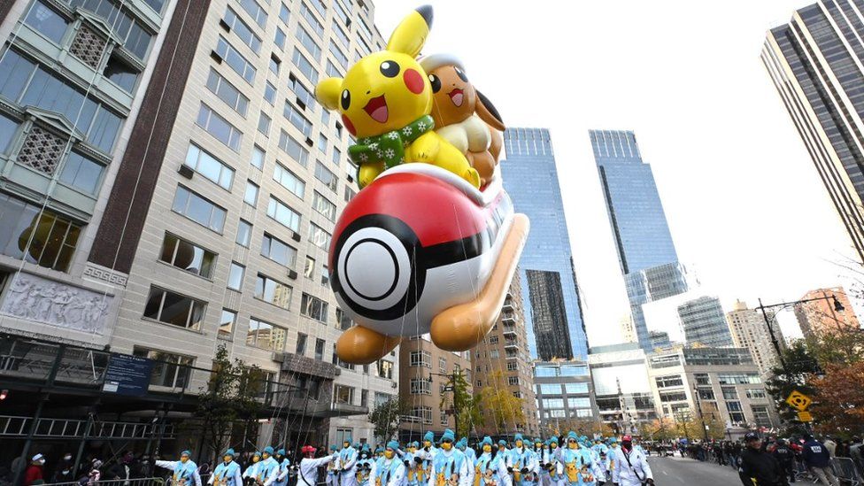 Pikachu and Eevee balloon during the 95th Macy's Thanksgiving Day Parade on November 25, 2021 in New York City
