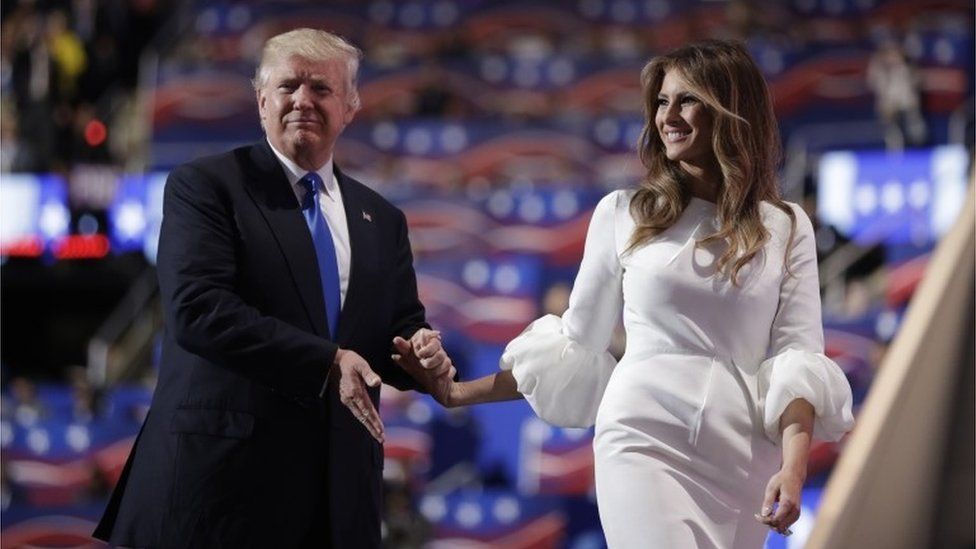 Republican presidential candidate Donald Trump walks off the stage with his wife Melania during the Republican National Convention.