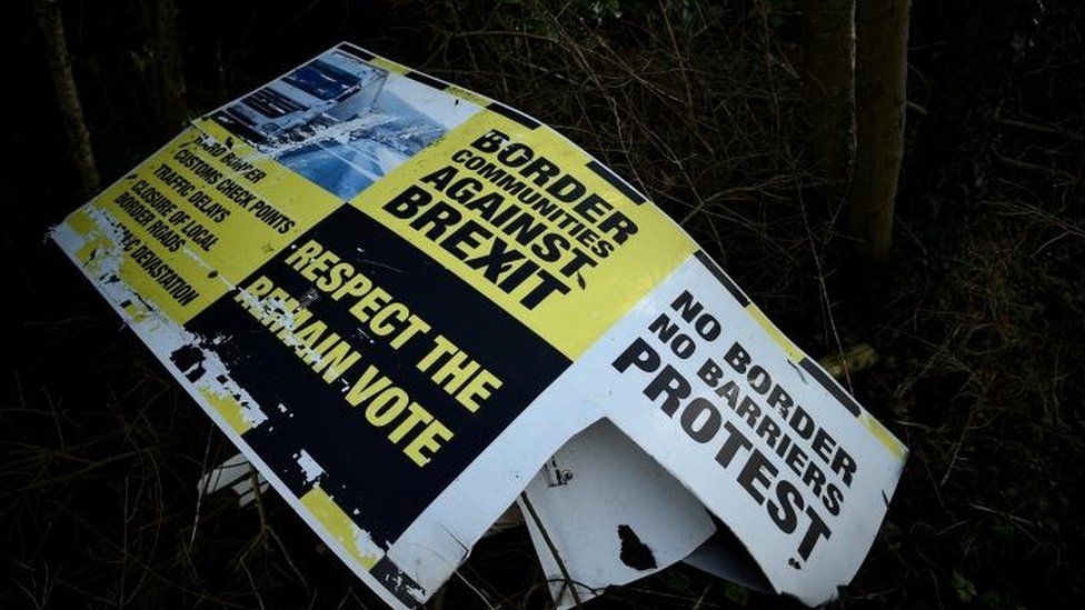 Discarded Brexit signage is seen between Donegal in the Republic of Ireland and Londonderry in Northern Ireland