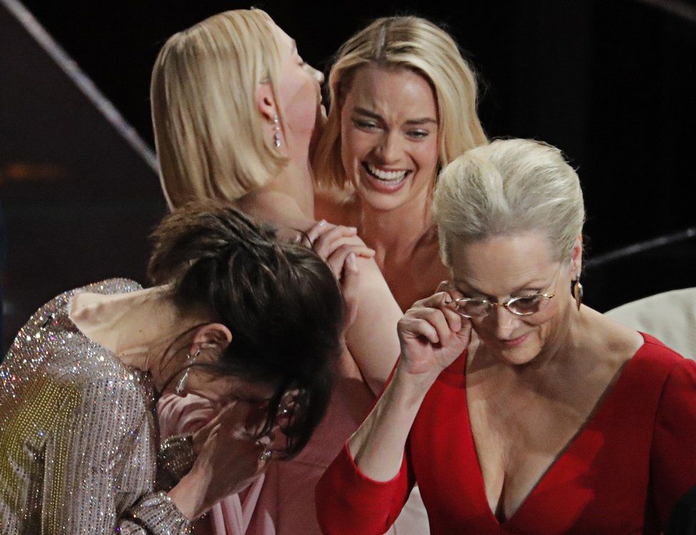 Sally Hawkins, Saoirse Ronan, Margot Robbie and Meryl Streep hugging each other