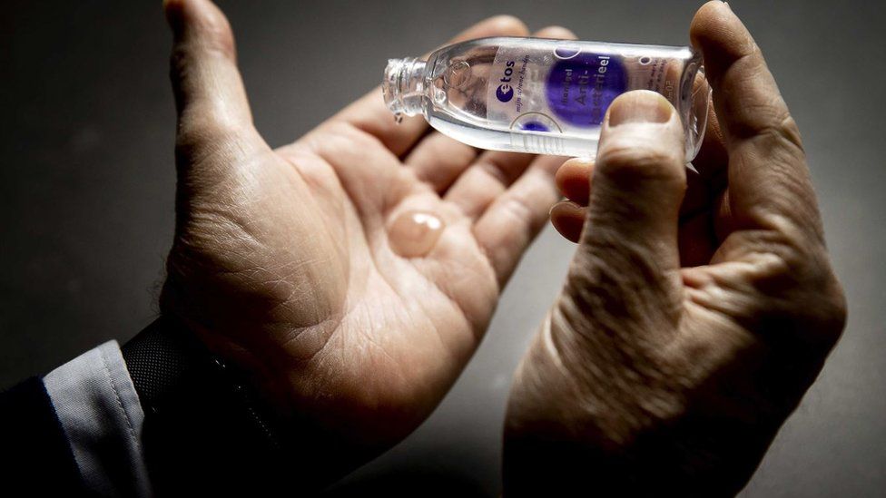 Generic picture of man using hand gel
