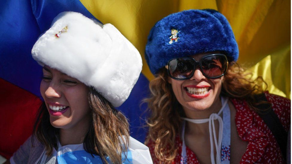 Football fans from Argentina sing songs and enjoy the party atmosphere of The World Cup near Red Square