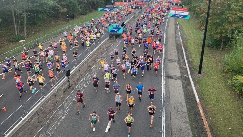 Aerial view of loads of runners starting the GNR