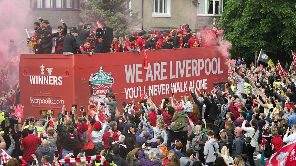A general view of of the team bus passing on Queens Drive during the trophy parade in Liverpool
