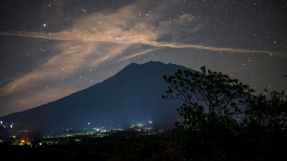 Starlit long exposure showing Bali's volcano silouette