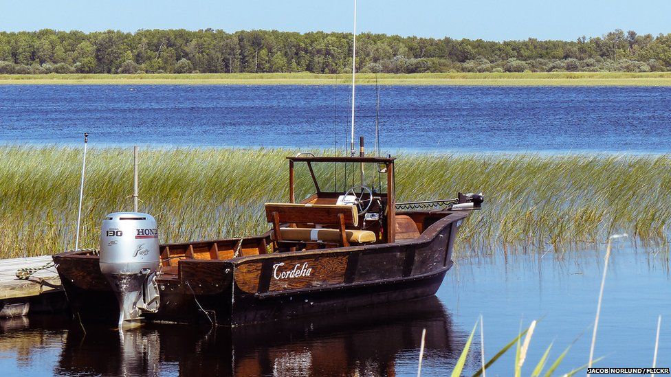 A boat overlooks the Northwest Angle vista.