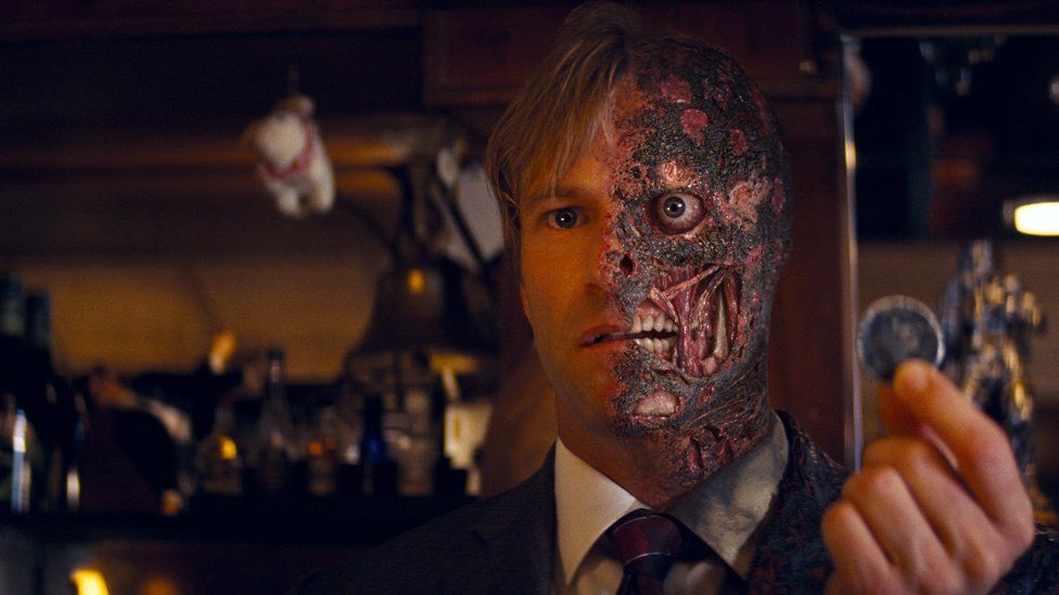 Aaron Eckhart as Harvey Dent / Two-Face in the Dark Knight