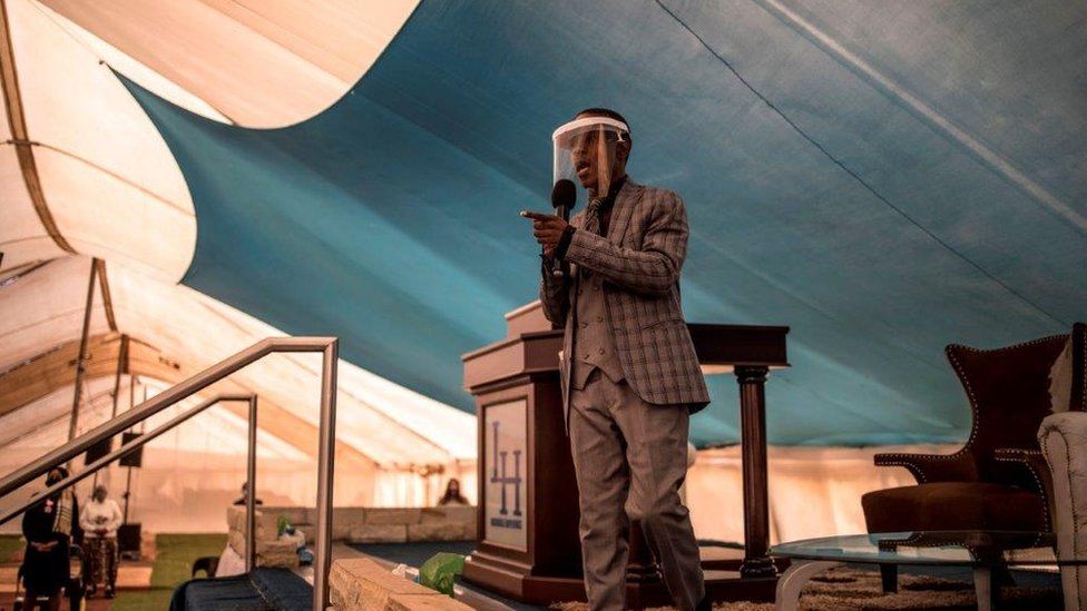 Prophet Paseka Motsoeneng, popularly known as Prophet Mboro, wears a face mask as he celebrates inside the Incredible Happenings Ministry Church, in Katlehong, Ekurhuleni on June 07, 2020.
