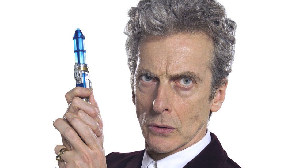 Peter Capaldi with a Sonic Screwdriver
