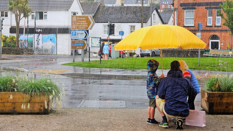 BREAKING NEWS The rainy scene in Braunton in Devon on Monday, shared by a BBC Weather Watcher
