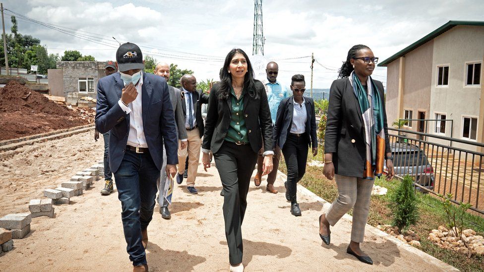 Then-Home Secretary Suella Braverman tours a building site on the outskirts of the Rwandan capital, Kigali, where asylum seekers deported from the UK could be housed