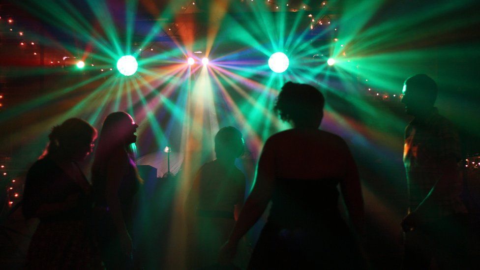 People dancing in a nightclub