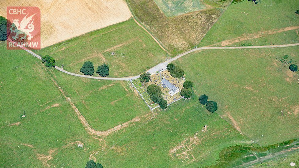 Parch marks of Roman buildings showing at Caerhun Roman fort