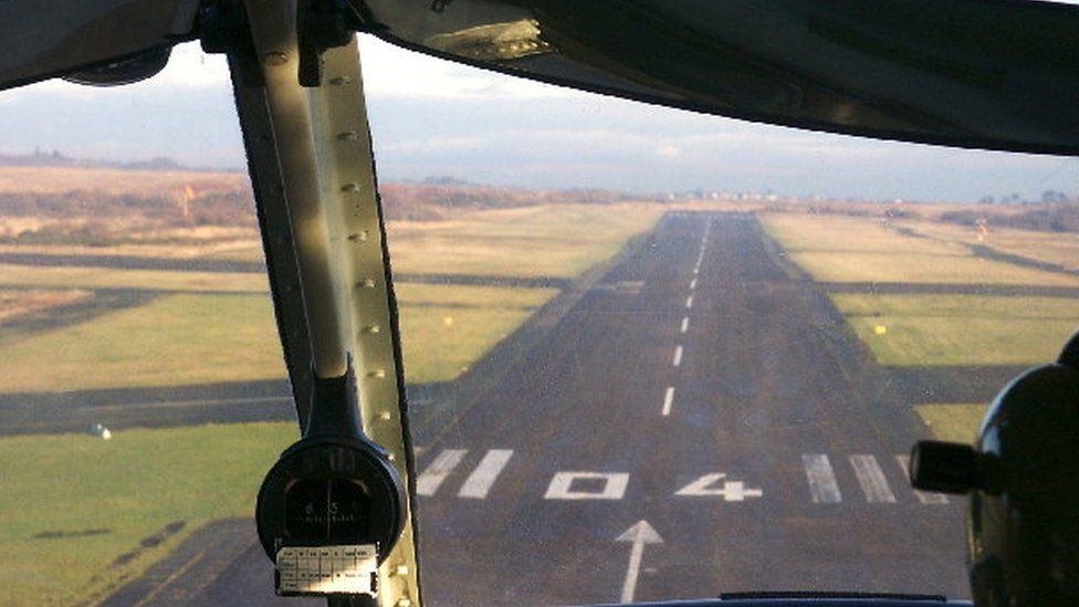 Aeroplane landing at Swansea airport