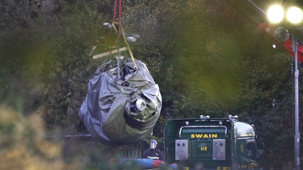 Helicopter removed from wreckage