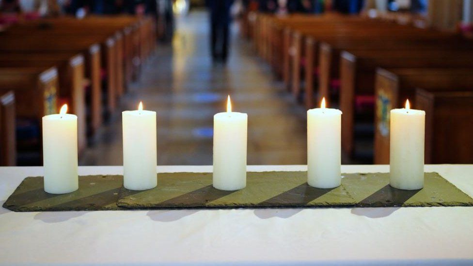 Candles at service at St Andrew's Church, Plymouth
