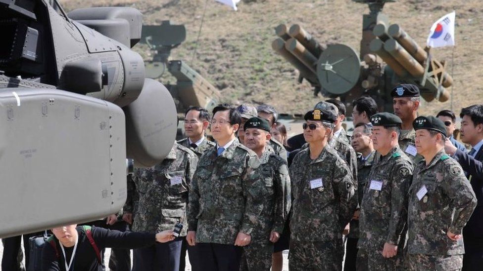 South Korean acting President Hwang Kyo-ahn (C, front) inspects a variety of fire arms during a firing drill in Pocheon, north of Seoul, South Korea, 26 April 2017