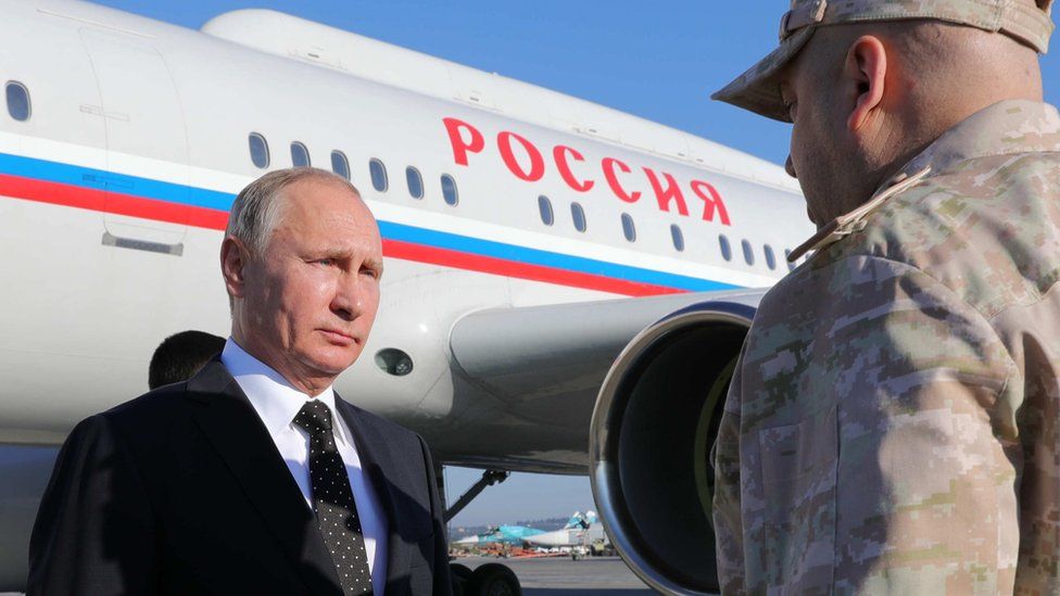Russian President Vladimir Putin arrives to the Russian air base in Hmeimim in Syria, 11 December 2017