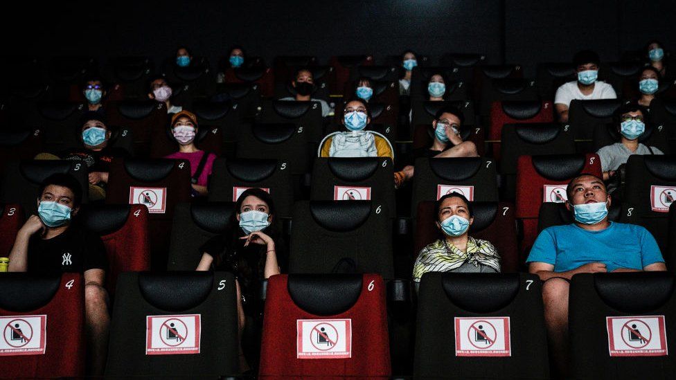 Residents watch a movie in a cinema in Wuhan on July 20, 2020 in Wuhan