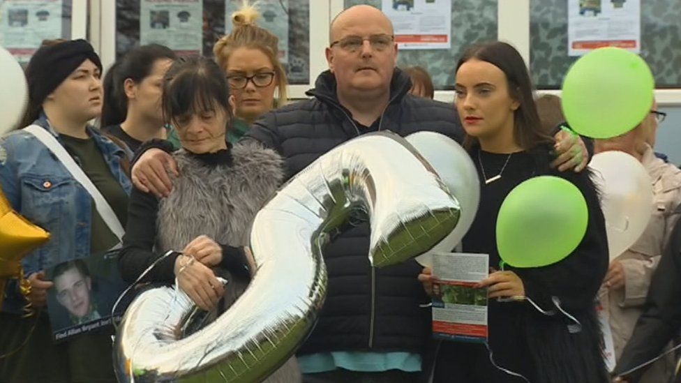 Bryant family with balloons marking five years since Allan went missing