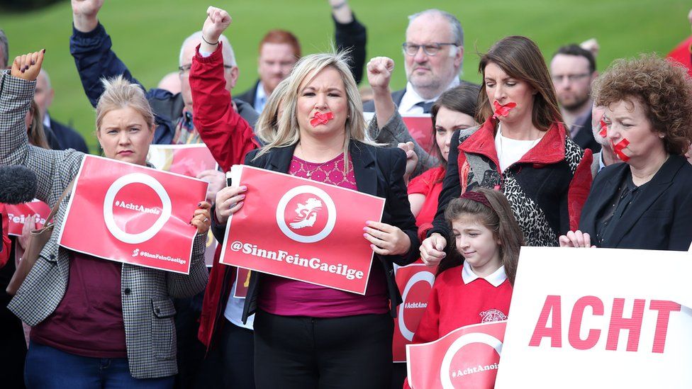 Sinn Féin's Michelle O'Neill and Irish language activists at a protest