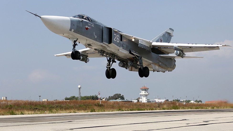 A handout picture dated 3 October 2015 from the Russian defence ministry shows a Russian SU-24 taking off from the Humaymim airbase, outside Latakia, Syria