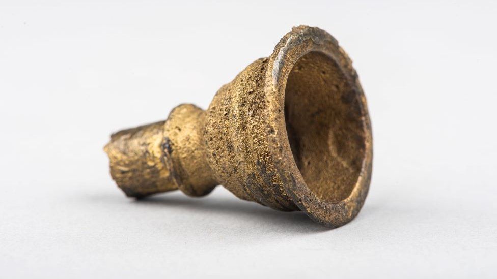 Trumpet mouthpiece found in wreckage