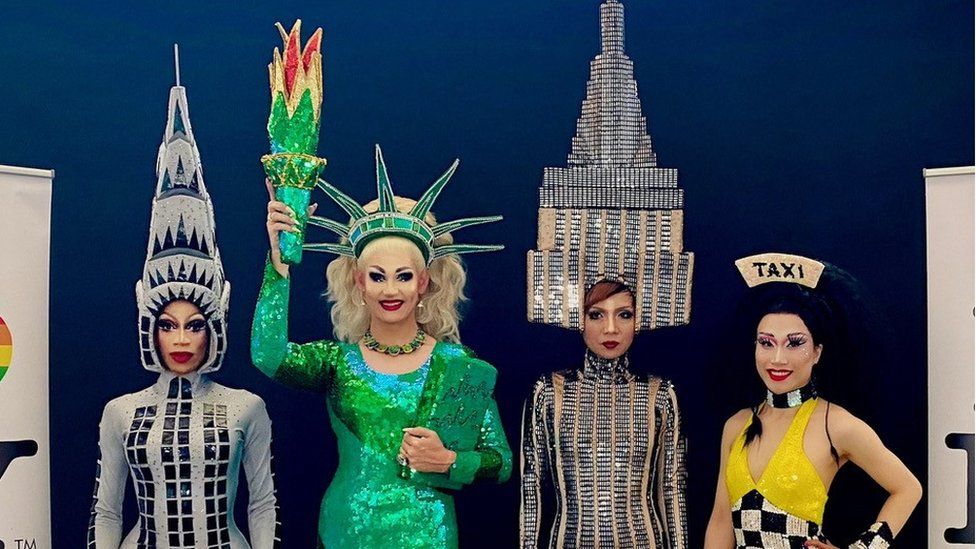 Screaming Queens drag performers dressed as the New York skyline