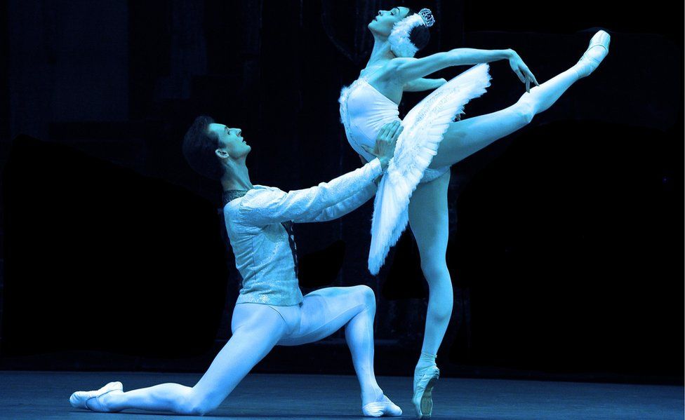 Olga Smirnova as Odette/Odile and Semyon Chudin as Prince Siegfried in The Bolshoi Ballet's production of Yuri Grigorovich's adaptation of Marius Petipa and Lev Ivanov's Swan Lake at The Royal Opera House on 2 August 2019 in London