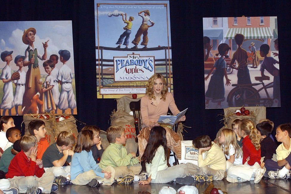 Madonna reads her new book 'Mr. Peabody's Apples' to students at Montclair Kimberly Academy on November 11, 2003 in Montclair, New Jersey