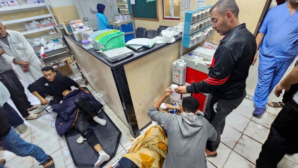Photo taken on 16 November 2023 showing wounded Palestinians being treated on the floor of the Indonesian Hospital in Beit Lahia, in the northern Gaza City