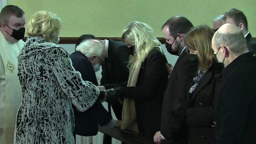 Irish President Michael D Higgins and his wife Sabina offer comfort to the Murphy family