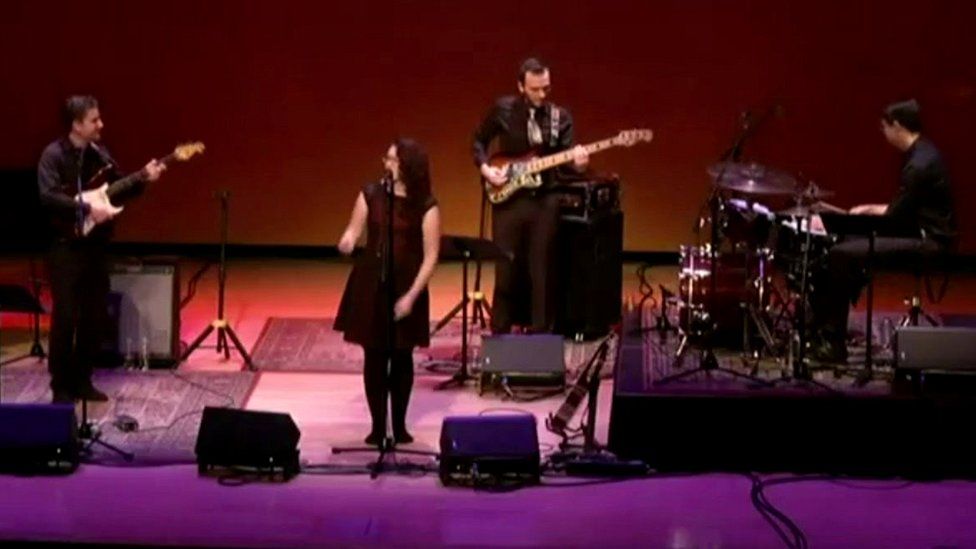Mandy Harvey on stage with her band