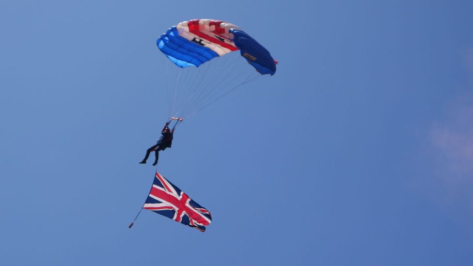 Parachute display team member in the air