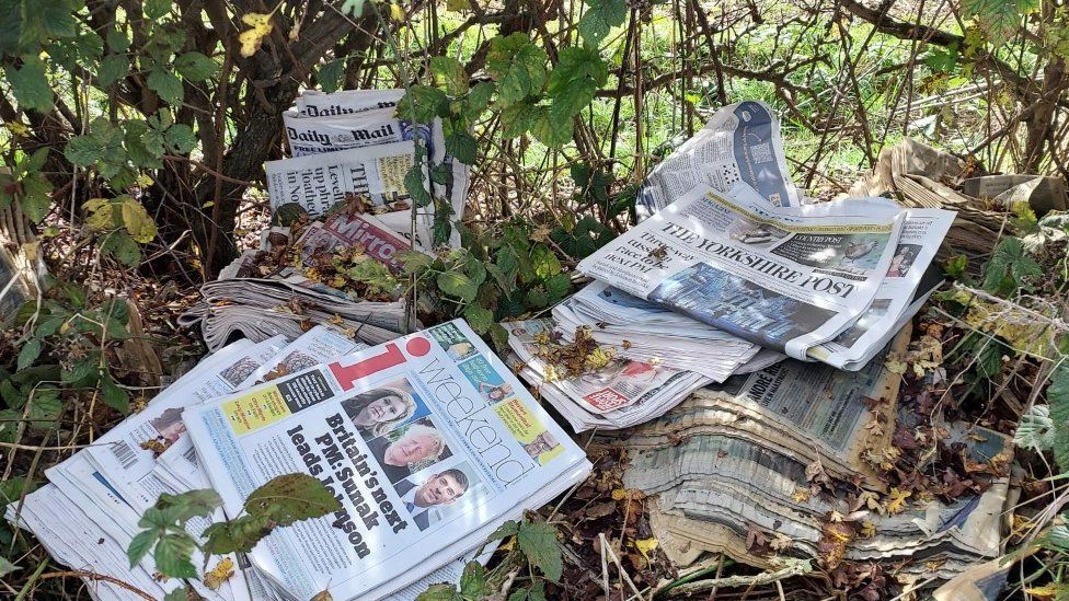 Dumped newspapers