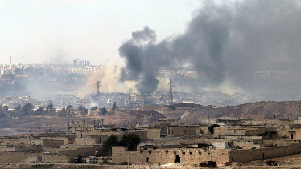 Smoke billows over the southern outskirts of Aleppo (file photo - 4 September)
