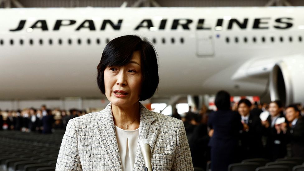 The newly-appointed President of Japan Airlines Co. Mitsuko Tottori speaks to the media after the company's initiation ceremony for newly hired employees at a hangar of Haneda airport in Tokyo, Japan, April 1, 2024.