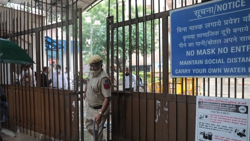 A police officer at the Rohini court after a shootout in New Delhi, India 24 September 2021.