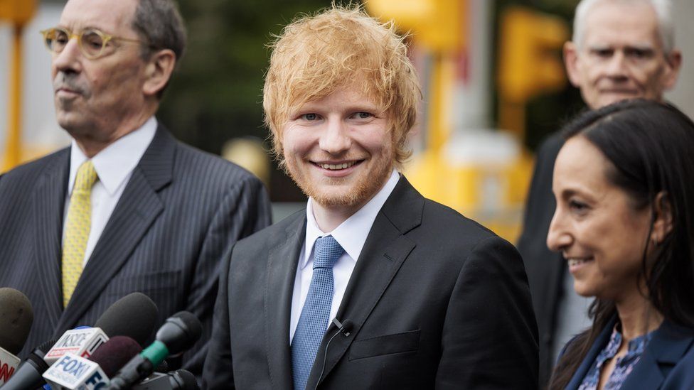 Musician Ed Sheeran (C) smiles while standing with his legal team after winning his copyright infringement case in New York, New York, USA, 04 May 2023