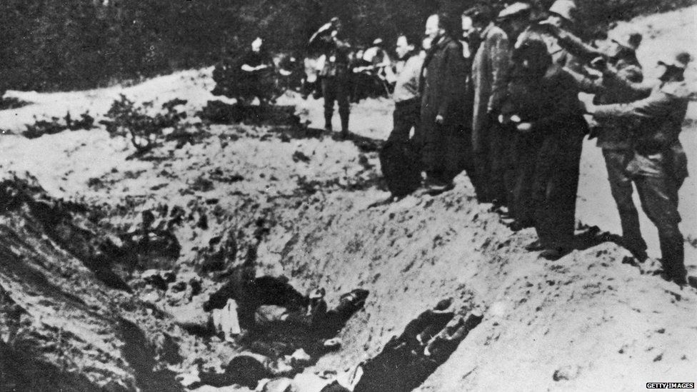 German SS soldiers shooting Jews