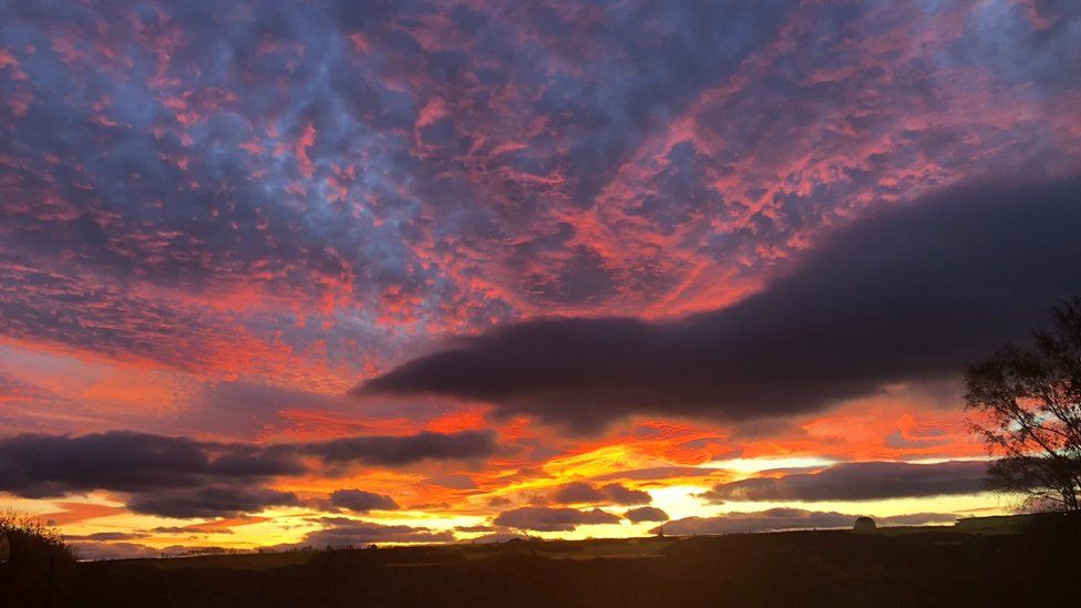 Spectacular sunsets light up UK skies BBC News