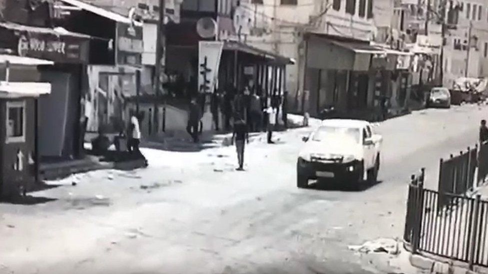 Screengrab of CCTV footage showing Abdul Rahman Hassan Ahmed Hardan standing in a street in Jenin moments before he was shot and killed by Israeli forces during a major military operation in the West Bank city (4 July 2023)