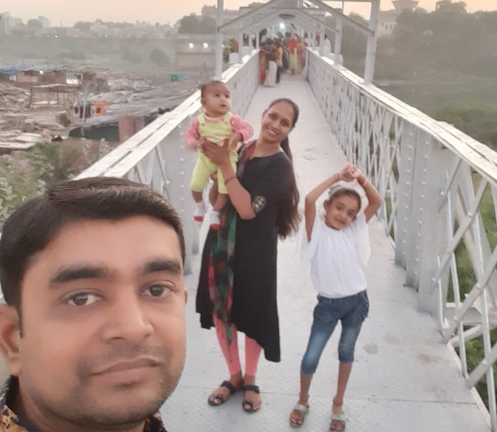 Nitin Kavaiya and family on the bridge, before its collapse