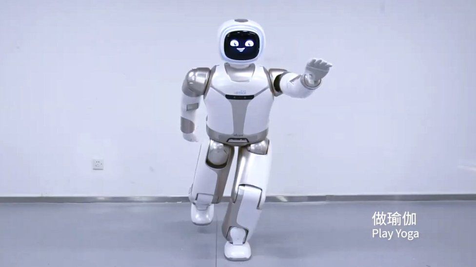 The UBTECH Walker robot pulling a yoga pose